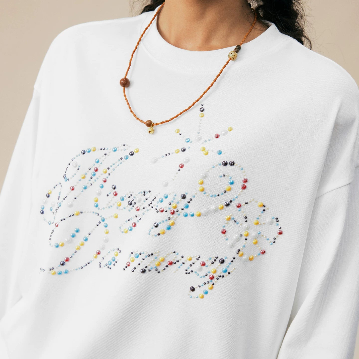MEDM colored stone nail bead logo casual round neck long sleeved T-shirt trendy, fashionable, comfortable, loose couple top for autumn and winter