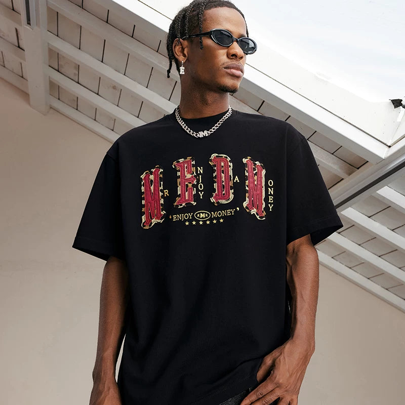 MEDM letter leather short sleeved T-shirt for men 2026 new style American retro casual five and a half sleeved shirt tee